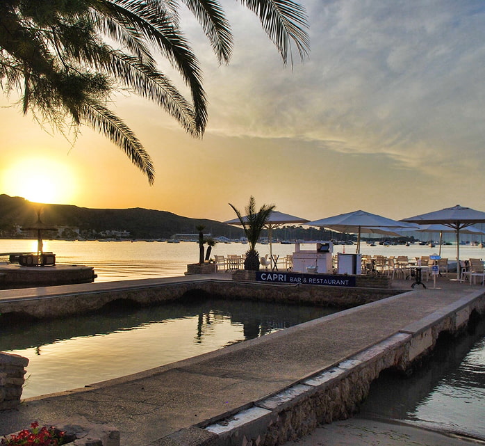 Capri Restaurant & Bar Capri Restaurant & Bar overlooking the sea at sunset